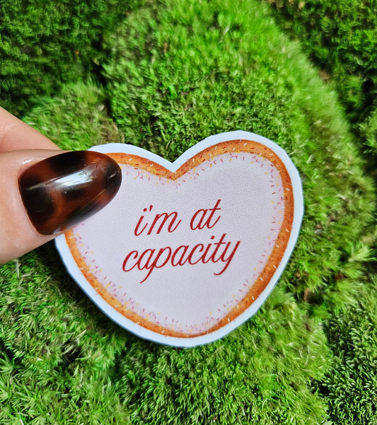 sticker "i'm at capacity"