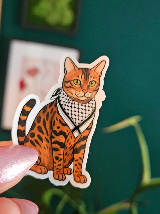 Lola with keffiyeh sticker