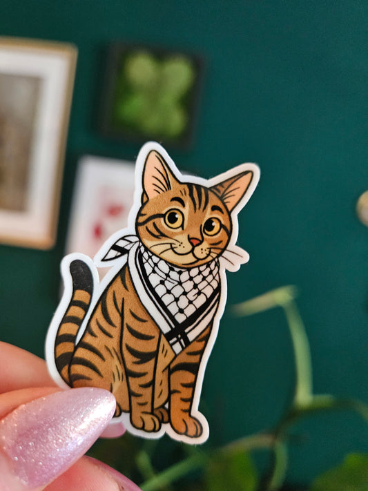 Mariam with keffiyeh sticker