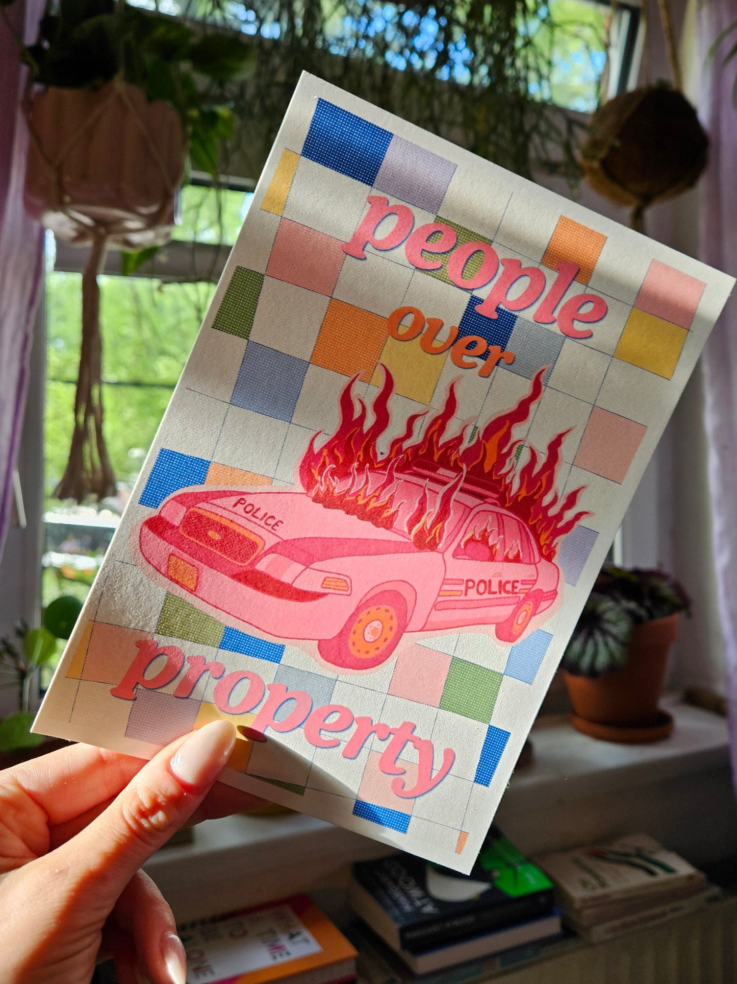 postcard "people over property"