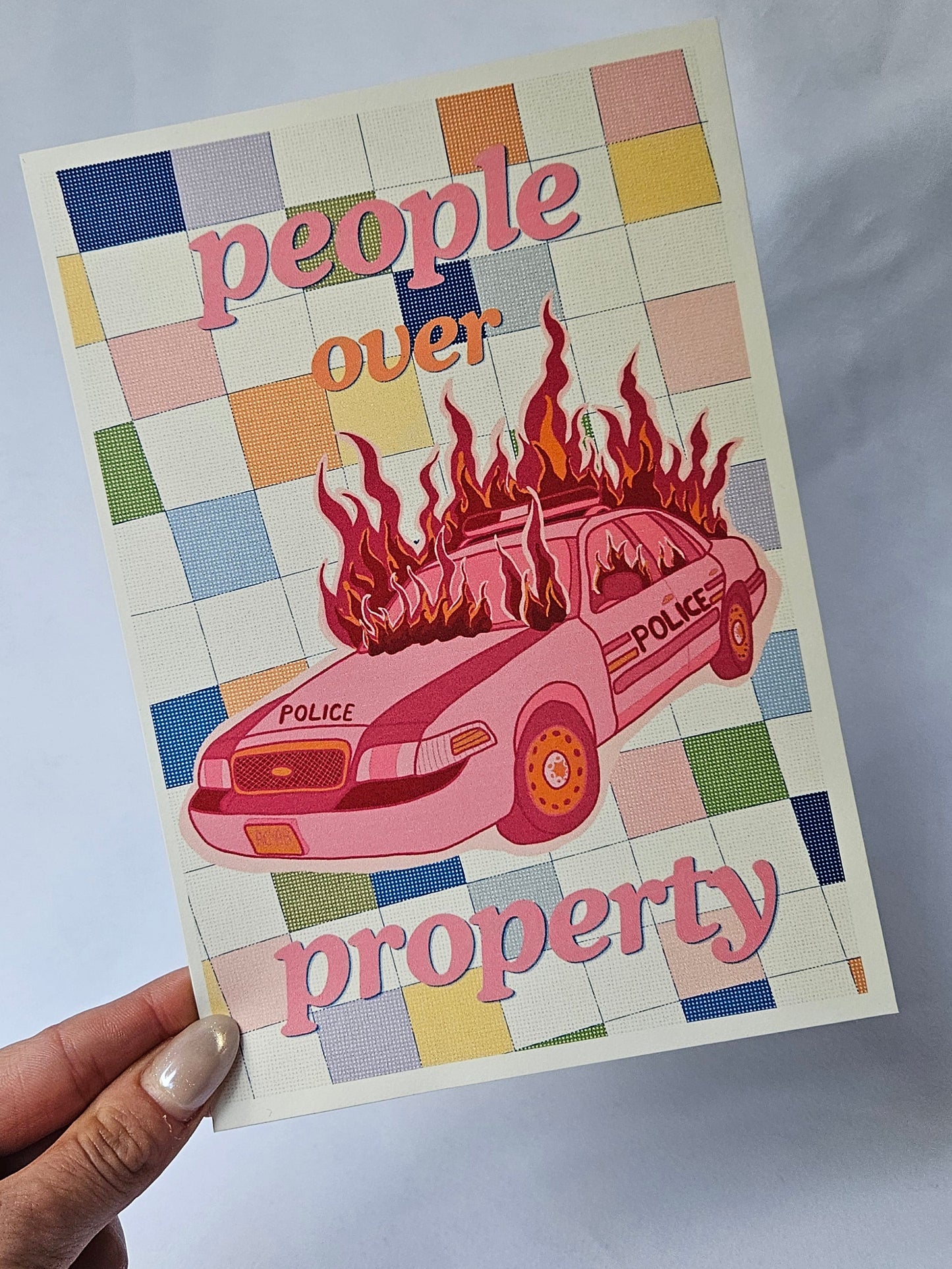 postcard "people over property"